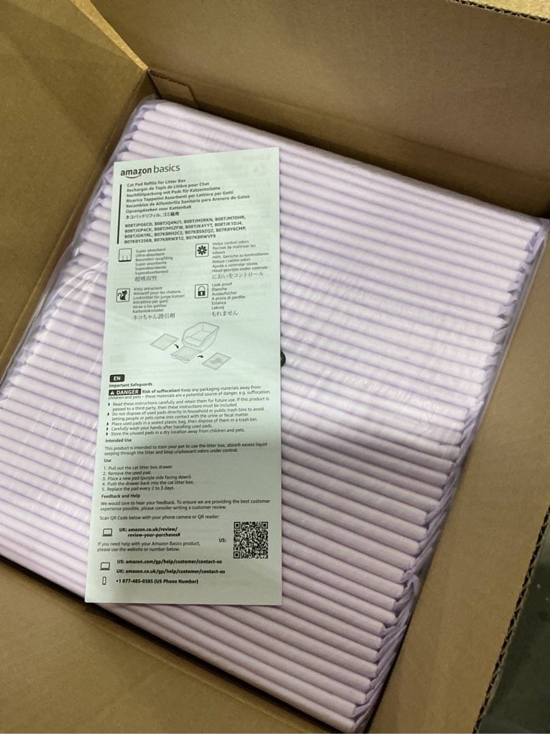 Condition photo showing New/Like New for amazon basics cat litters pee pads, 40 count, universal fit for litter box, odor control with lemon scent, purple and white lemon 40 count (pack of 1)