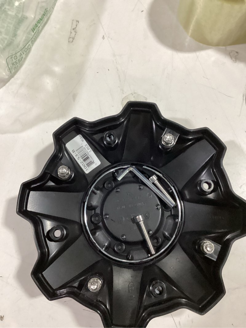 Condition photo showing As Is for fuel offroad wheels 1002-53gb 1002-53 gloss black wheel center cap