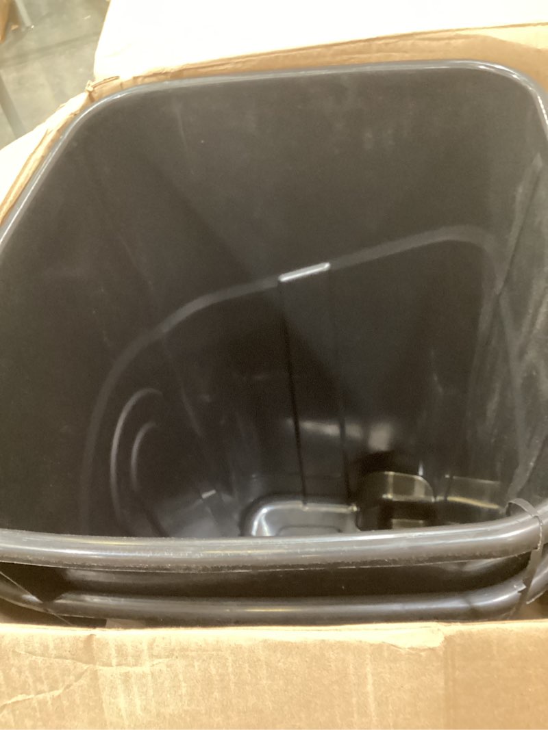 Condition photo showing As Is for united solutions 32 gallon wheeled outdoor garbage can with attached snap lock lid and heavy-duty handles, black, heavy-duty construction, perfect backyard, deck, or garage trash can, 2 pack black 32 gallon - 2 pack wheeled garbage can