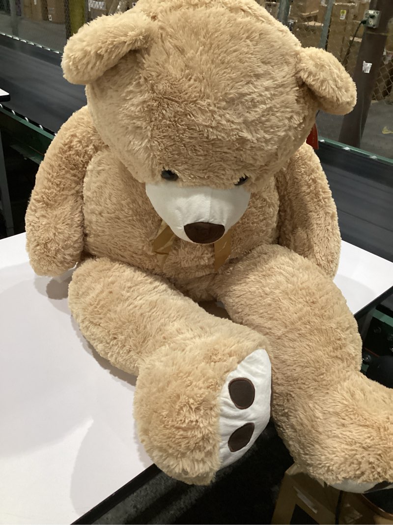 Condition photo showing Good Condition for MaoGoLan Giant Teddy Bear Stuffed Animal, 52" Large Tan Teddy Bear Plush Toy with Cute Bow Tie & Footprints, Soft Sunggle Bear Plushies Gift for Kids Grilfriend Wife on Christmas Birthday Baby Shower Light Brown 52 inches