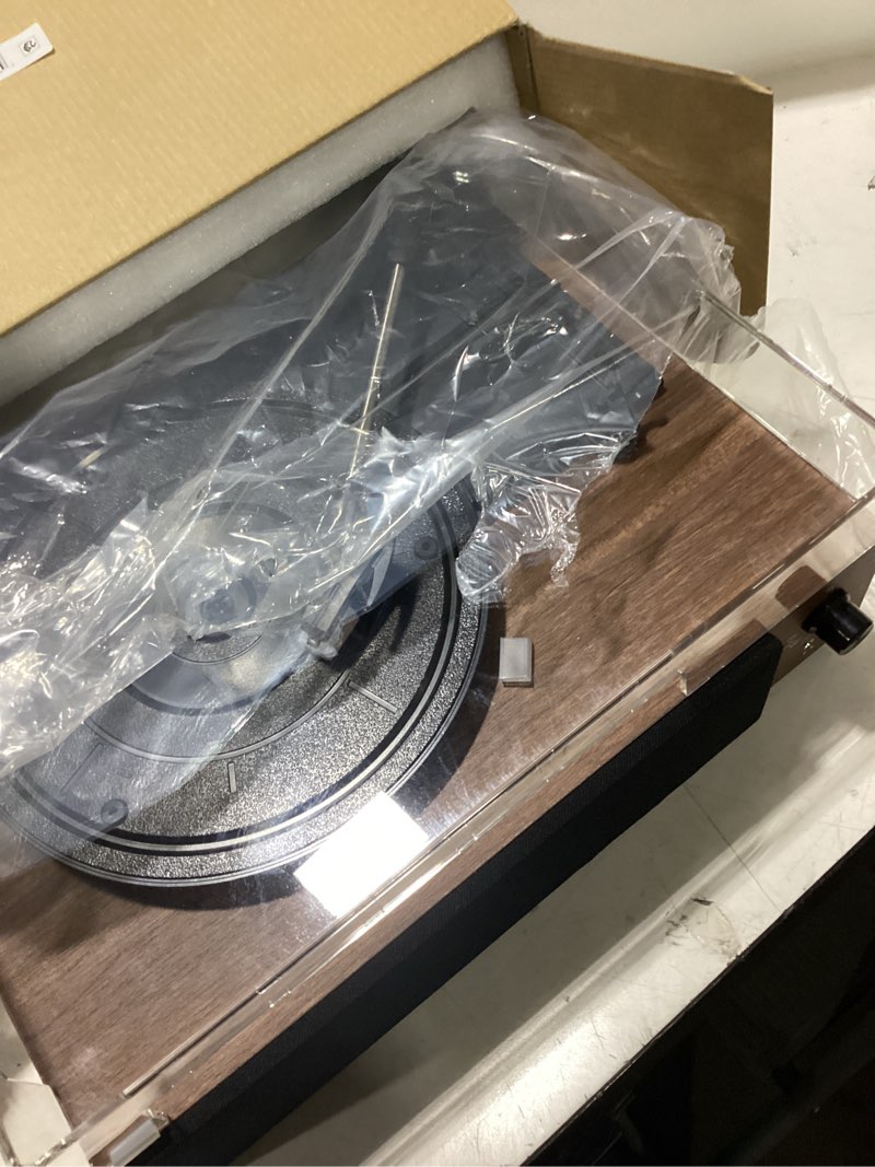 Condition photo showing Good Condition for core innovations wireless bluetooth turntable, 3-speed vinyl record player with built-in speakers, wood finish & clear dust cover