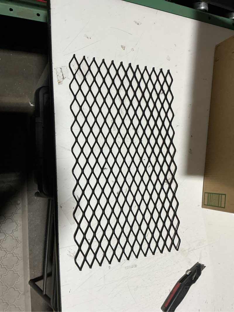 Condition photo showing Good Condition for 12" steel ember retainer for fireplace grates | enhances burning efficiency in indoor fireplaces | durable fire accessory fits 16 18 24 inch fireplace grates | easy setup for cozy fire experience