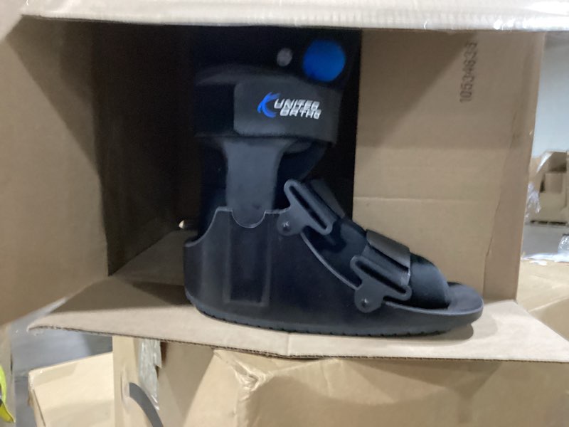 Condition photo showing Good Condition for united ortho short air cam walker fracture boot, large, black black large boot