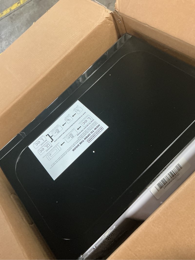 Condition photo showing As Is for BLACK+DECKER EM720CB7 Digital Microwave Oven with Turntable Push-Button Door, Child Safety Lock, 700W, Stainless Steel, 0.7 Cu.ft 0.7 cu. ft.