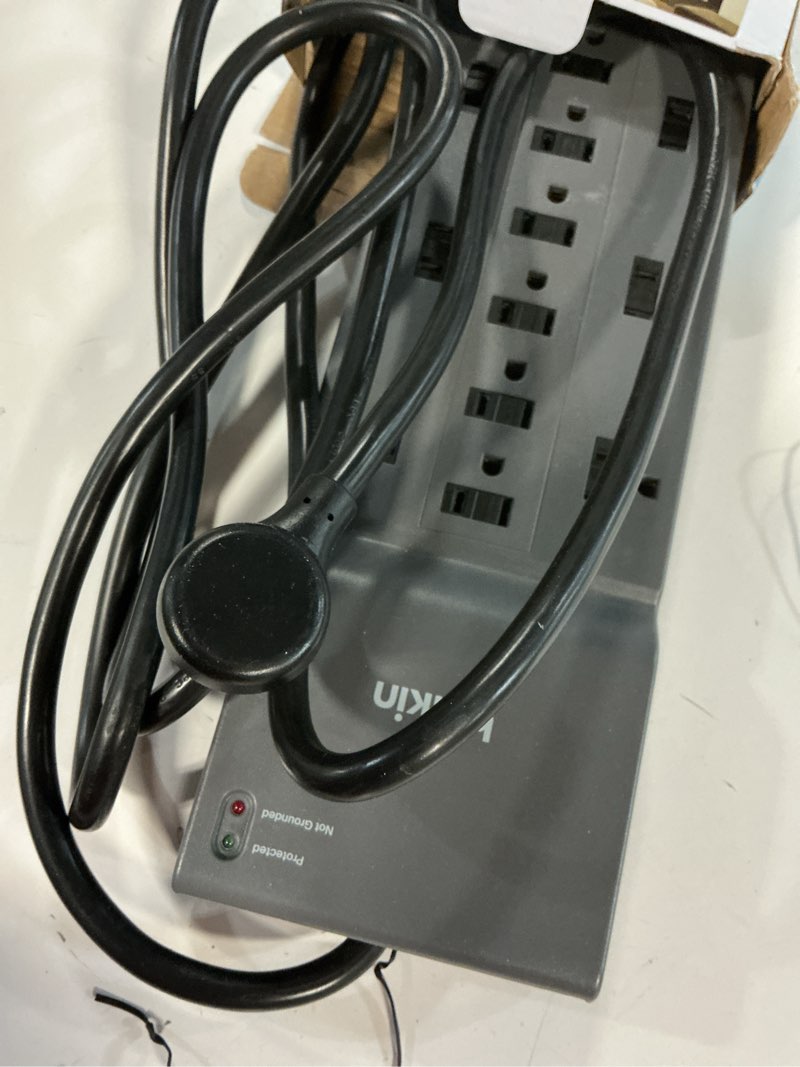 Condition photo showing Good Condition for Belkin 12-Outlet Surge Protector Power Strip w/ 12 AC Outlets & 8ft Flat Plug, UL-listed Heavy-Duty Extension Cord for Home, Office, Travel, Computer, Laptop, Charger - 3,940 Joules of Protection 1 Pack New Version