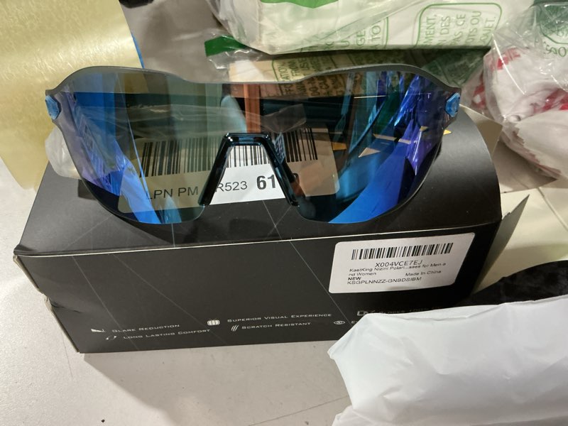 Condition photo showing Good Condition for kastking nizini polarized sports fishing sunglasses, with purivex protective lens coating, rimless wrap design, men women b: gloss navy blue demi frame, ice blue mirror