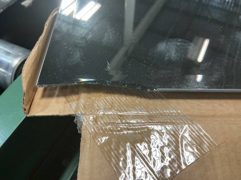 Condition photo showing As Is for project source 20-in w x 24-in h silver beveled frameless wall mirror