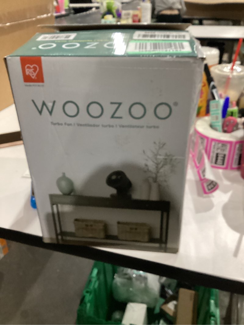 Condition photo showing New/Like New for iris usa woozoo air circulator fan with remote, oscillating, 3 speeds, 56ft max air distance, adjustable tilt, quiet motor, small fan for bedroom, office, dorm, black table top black