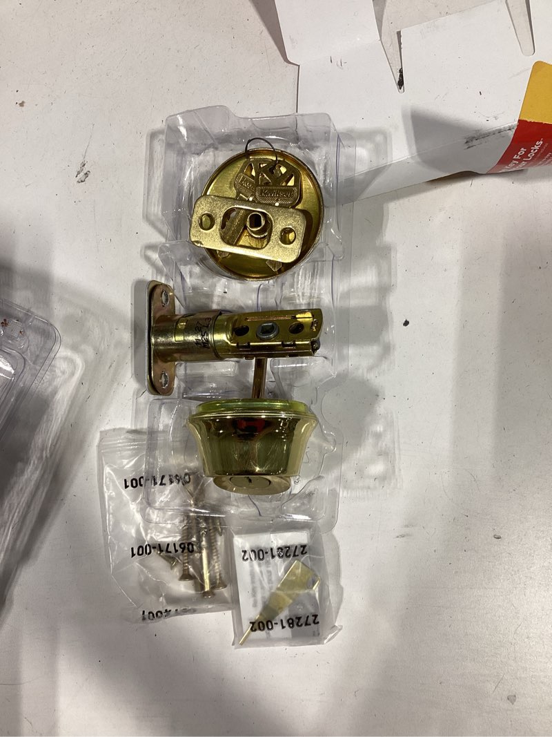 Condition photo showing New/Like New for kwikset smartkey security polished brass metal single cylinder deadbolt