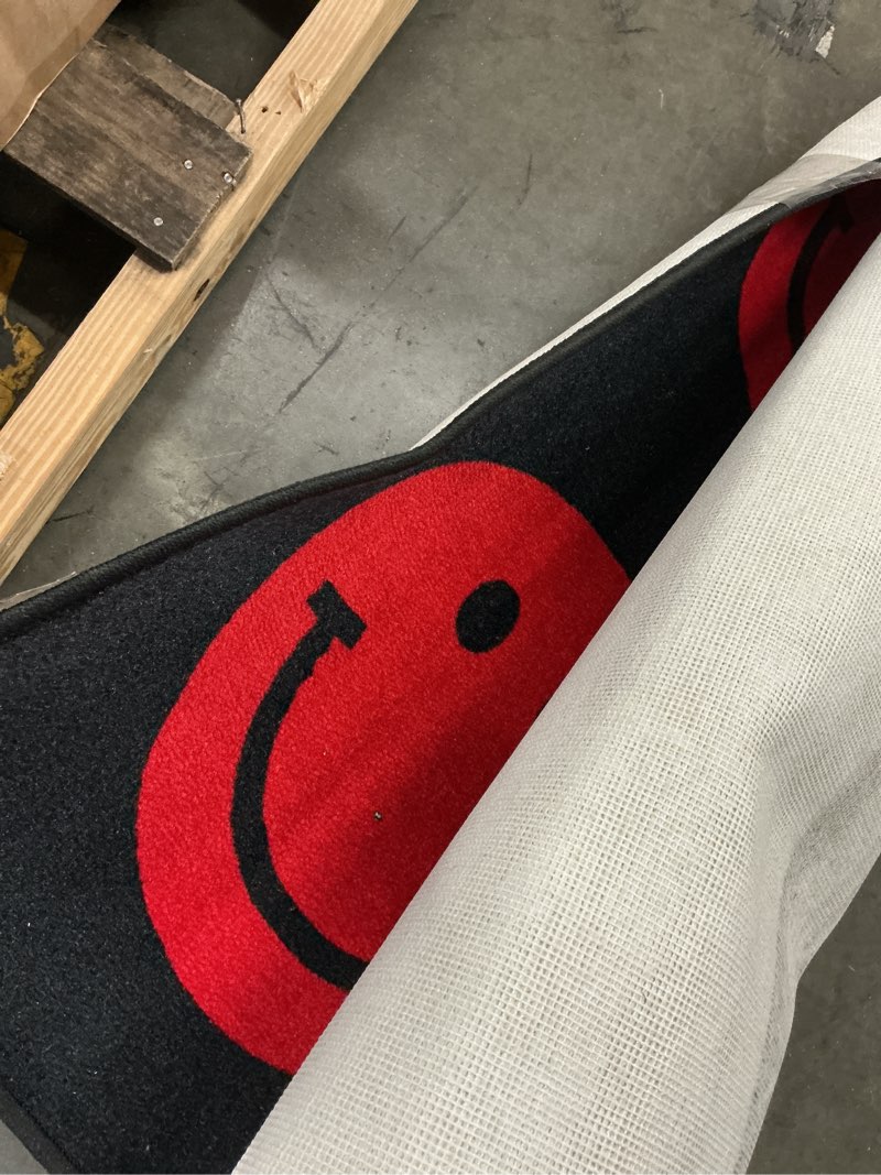 Condition photo showing As Is for Flagship Carpets Schoolgirl Style Rainbow Smileys in Black Criss-Cross Applesauce Educational Area Rug for Kids Room, Children's Classroom for Teaching & Playroom, 7'6" x 12', Black & Multi, Seats 28 7'6" x 12' (Rectangular) Black & Multi