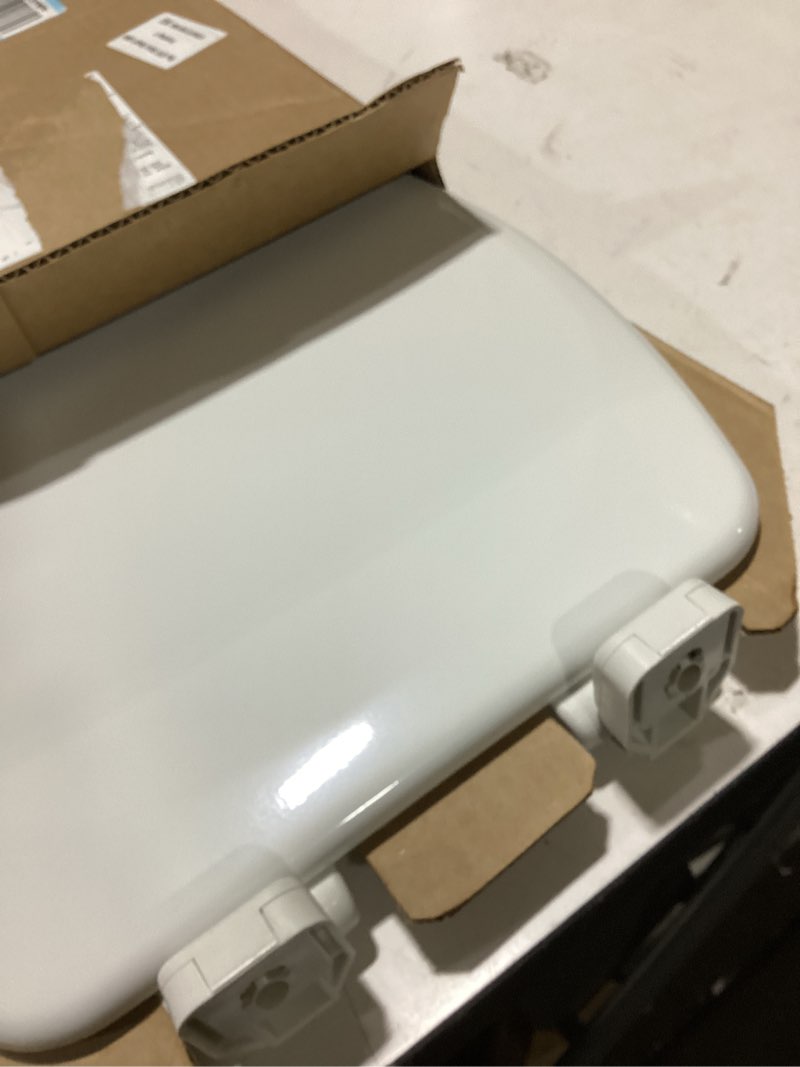 Condition photo showing As Is for mayfair linden slow close toilet seat, non slip heavy duty wood, easy install, elongated, white elongated traditional hinge