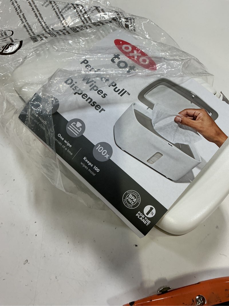Condition photo showing New/Like New for oxo tot perfect pull wipes dispenser, gray