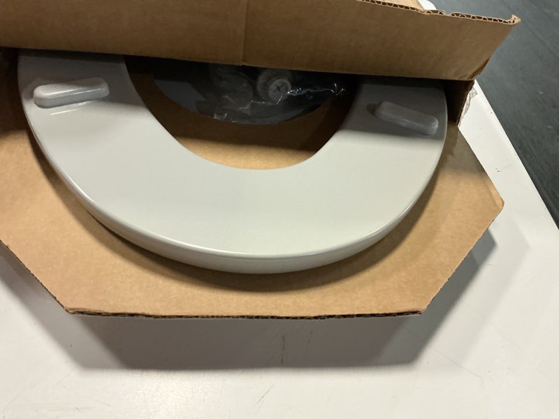 Condition photo showing As Is for bemis 1500ec durable wood toilet seat with easy clean hinges, made in usa, elongated, ice grey elongated 1-pack elongated