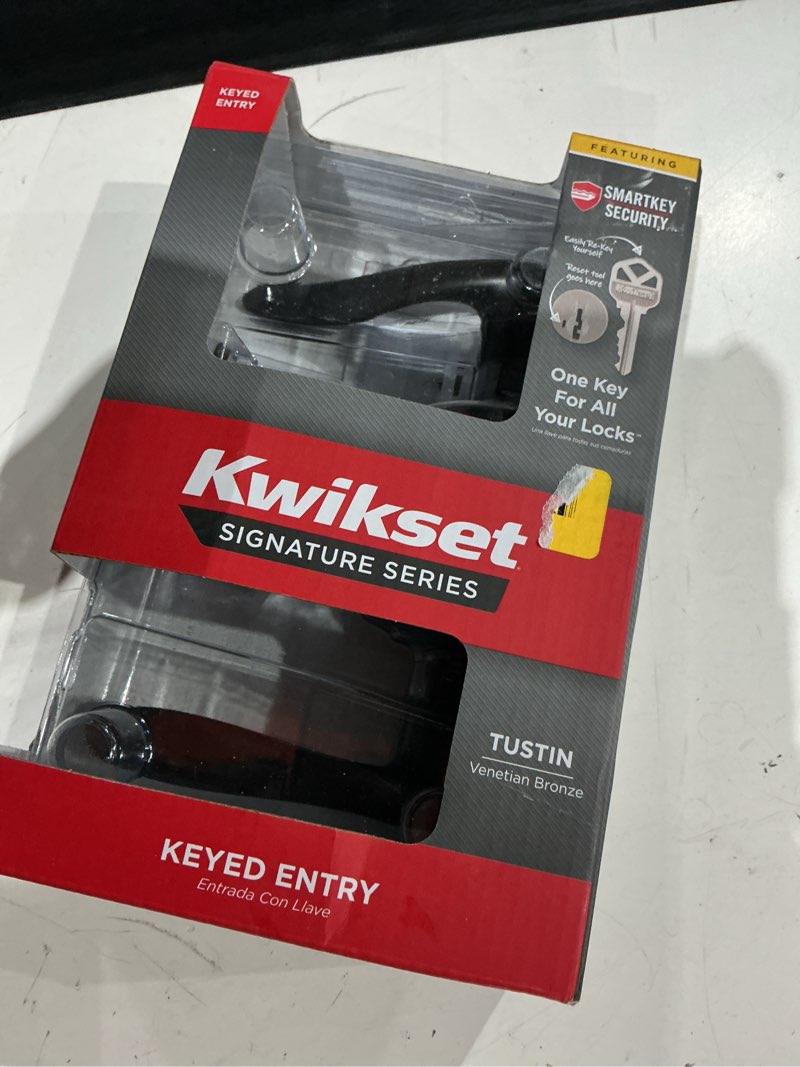 Condition photo showing As Is for kwikset smartkey tustin venetian bronze entry door knob kw1 1-3/4 in.