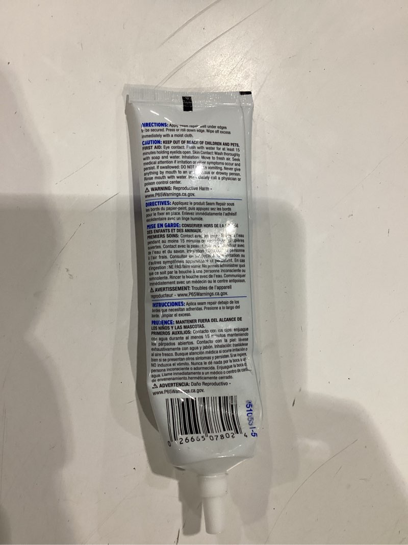 Condition photo showing New/Like New for roman seam repair adhesive - sealer for wallpaper tears and loose or overlapping edges - white, 3 ounce tube with applicator nozzle