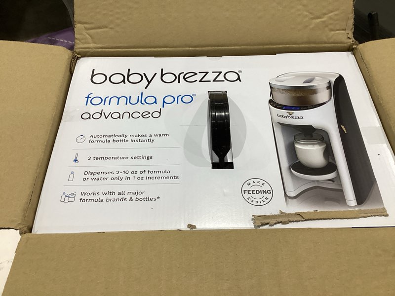 Condition photo showing New/Like New for baby brezza new and improved formula pro advanced formula dispenser machine - automatically mix a warm formula bottle instantly - easily make bottle with automatic powder blending, white