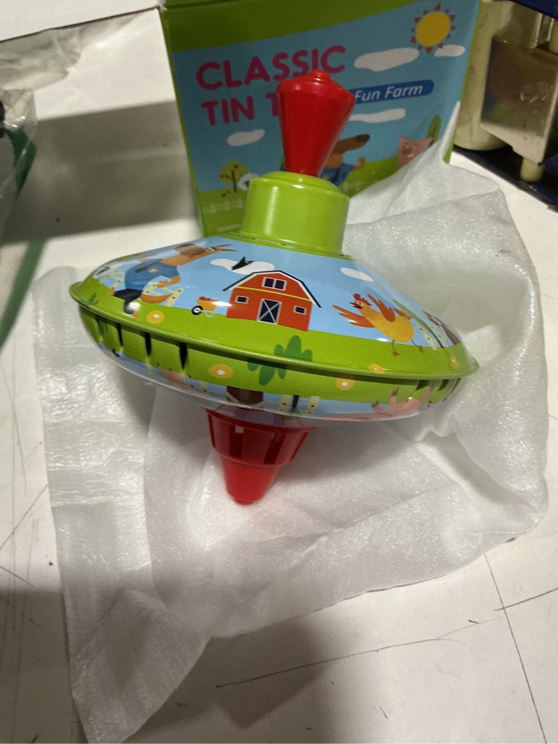Condition photo showing New/Like New for fun farm spinning top tin toy for kids – retro classic toys - toddler traditional spin tops - metal fidget spinner for kindergarten – sensory gyroscope - novelty present party favors