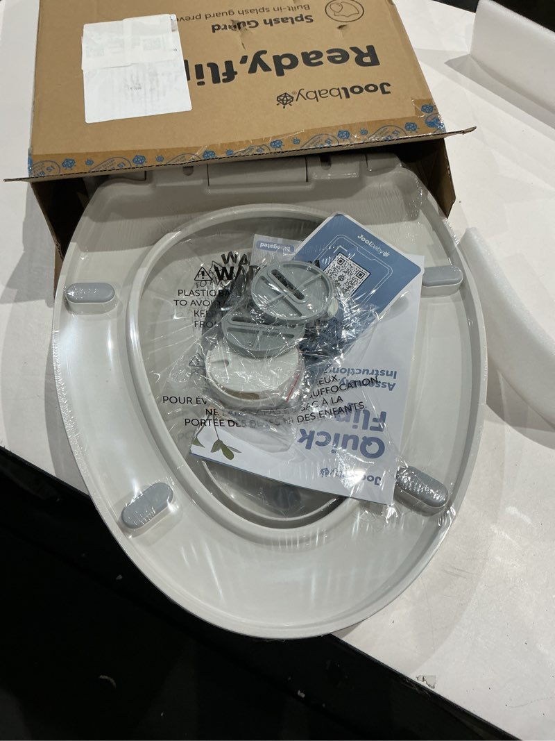 Condition photo showing Good Condition for jool baby quick flip toilet seat with built-in potty & splash guard for toddler training, slow close (elongated) oblong