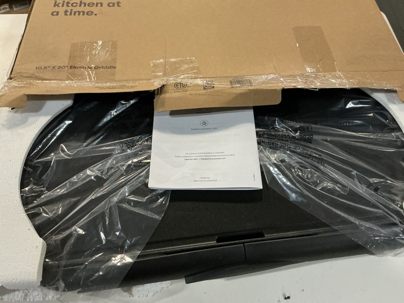 Condition photo showing New/Like New for bella electric non-stick griddle, make 10 eggs at once, healthy-eco non-stick coating, hassle-free clean up, large submersible cooking surface, 10.5" x 20", black 10" x 20" black