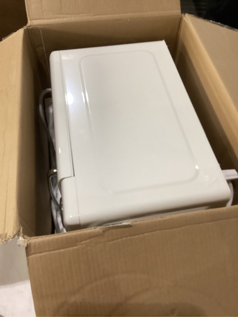 Condition photo showing Good Condition for Not tested Nostalgia Retro 700W Microwave Oven 0.7 Cu Ft Capacity – Child Safety Lock, 8 Auto-Cook Settings – Countertop Kitchen Appliance – Ivory 0.7 Cu. Ft. Ivory