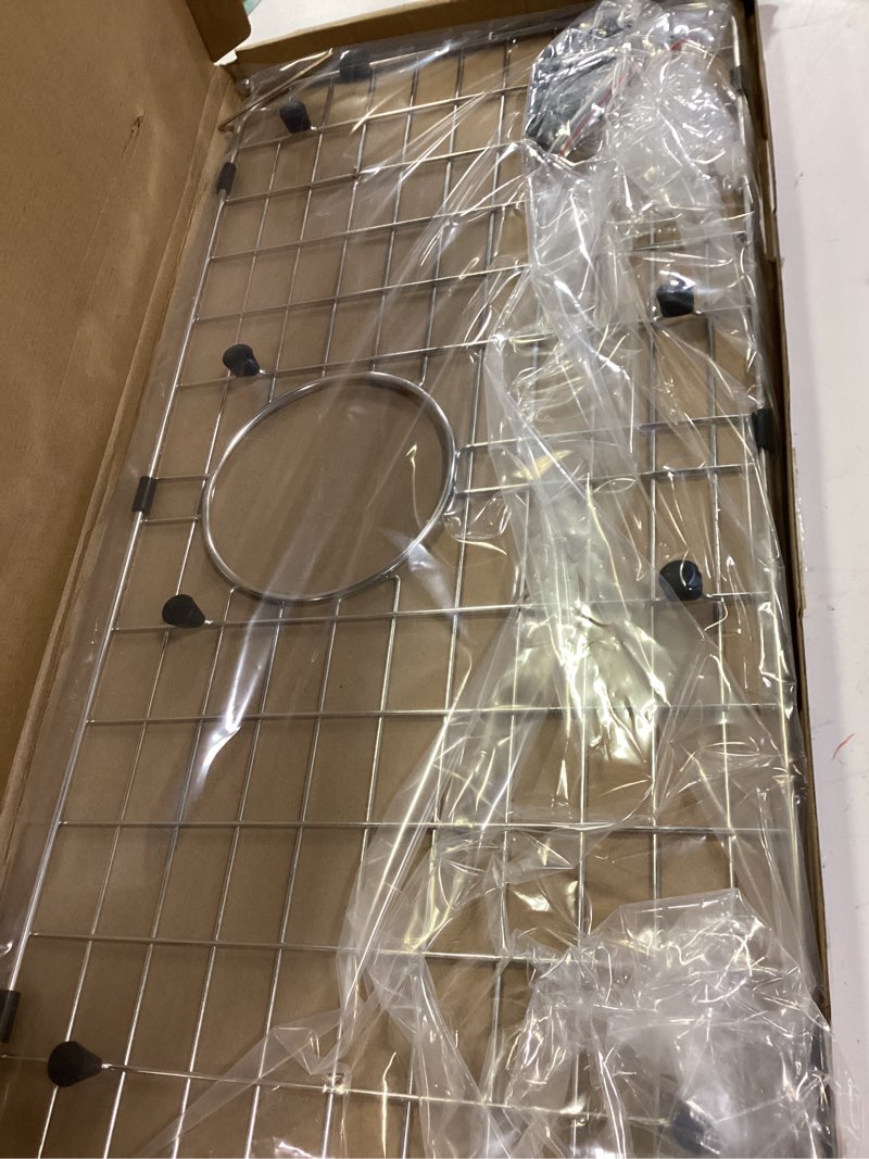 Condition photo showing Good Condition for serene valley 25-1/4" x 12-1/2“ sink grid, rear drain with corner radius 1-1/2", nlw2513r
