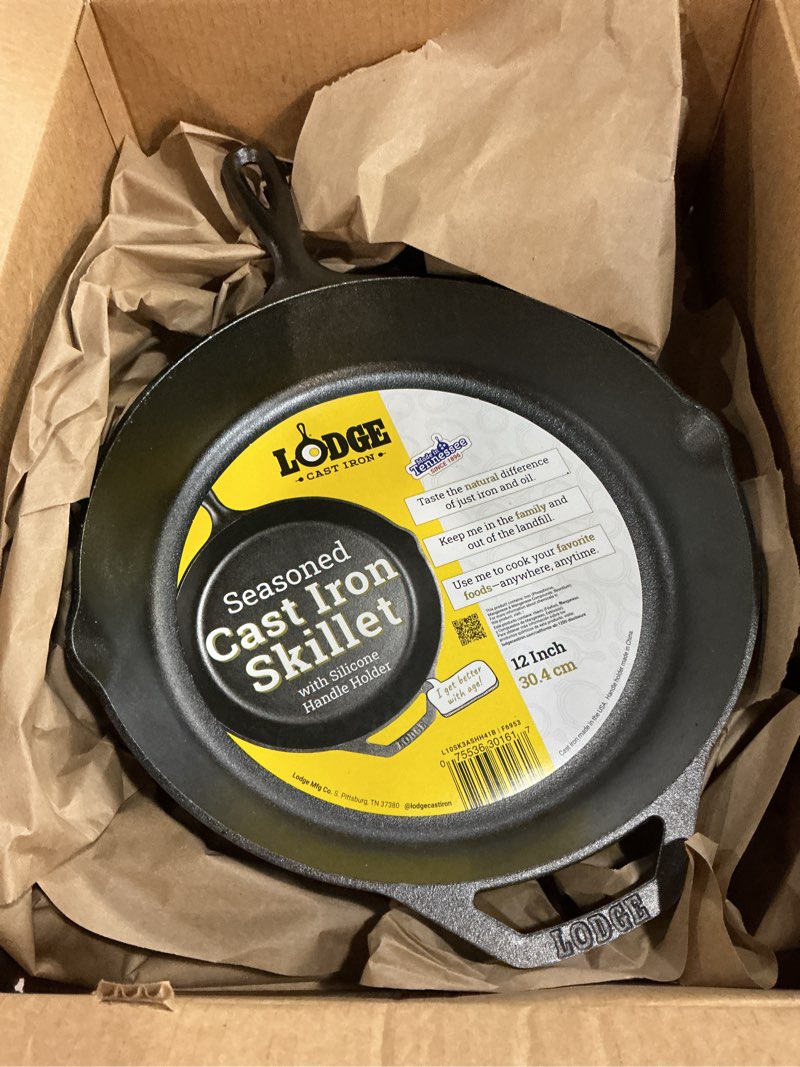 Condition photo showing Good Condition for Lodge 12 Inch Cast Iron Skillet with Red Silicone Hot Handle Holder – Pre-Seasoned Frying Pan for Stove, Oven, Grill & Campfire – Made in the USA – Durable, Nonstick Cast Iron Cookware – Black 12 inch + Hot Handle Holder