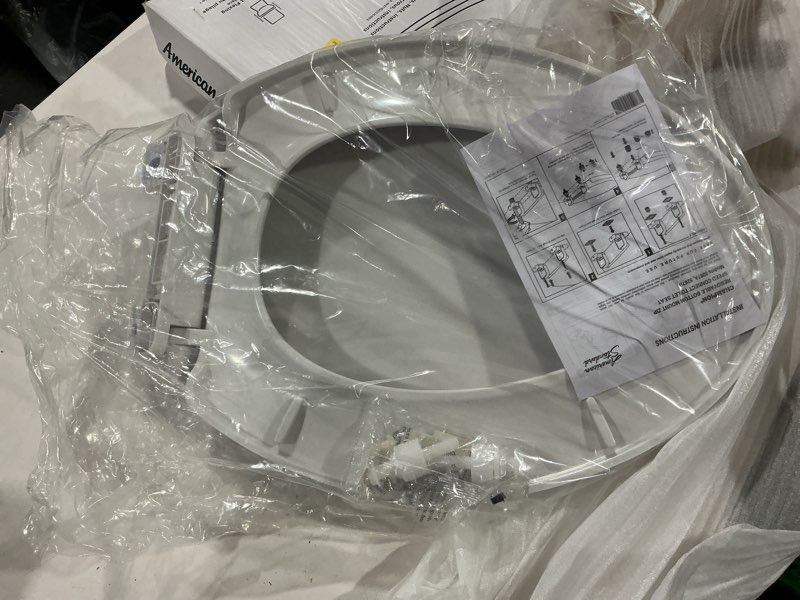 Condition photo showing As Is for american standard mightytuff plastic white elongated soft close toilet seat