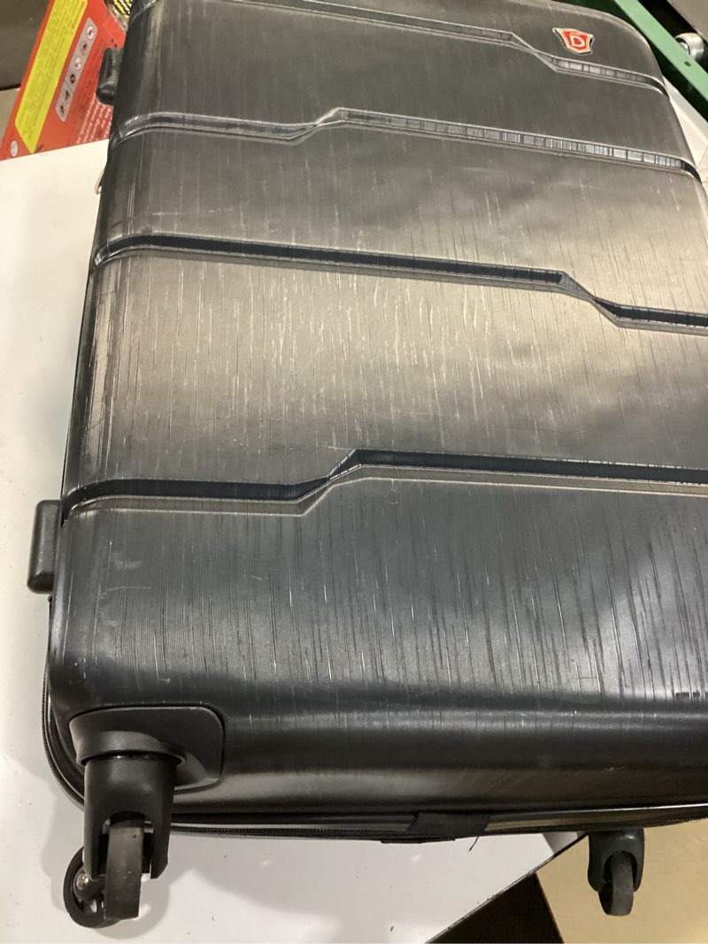Condition photo showing Good Condition for dukap rodez hardside luggage with ergonomic handles and tsa lock | spacious traveling suitcase, travel suitcase with four spinner wheels and studs | 24" medium luggage | black
