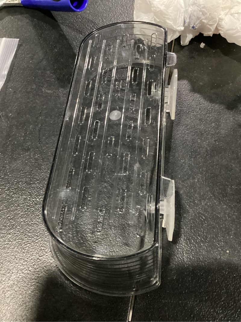 Condition photo showing As Is for plastic suction cup organizer for shower bath windows or any othr flat smooth surface
