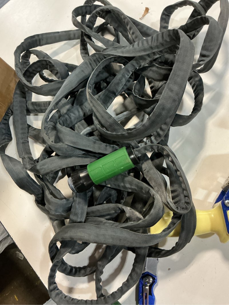 Condition photo showing As Is for expert gardener lightweight performance garden hose 25’