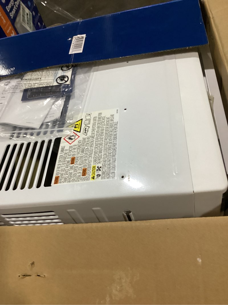 Condition photo showing As Is for 10,000btu 115-volts smart window air conditioner for 450 sq. ft. in white with wi-fi and remote