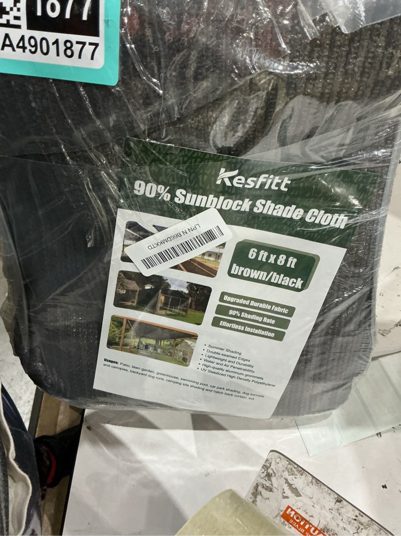 Condition photo showing Good Condition for 90% sun shade cloth, kesfitt 6x8ft garden shade cover with reinforced grommets, mesh tarp sun privacy screen for greenhouse, plant, pergola, and backyard patio sunshade brown 90% shading rate 6ftx8ft