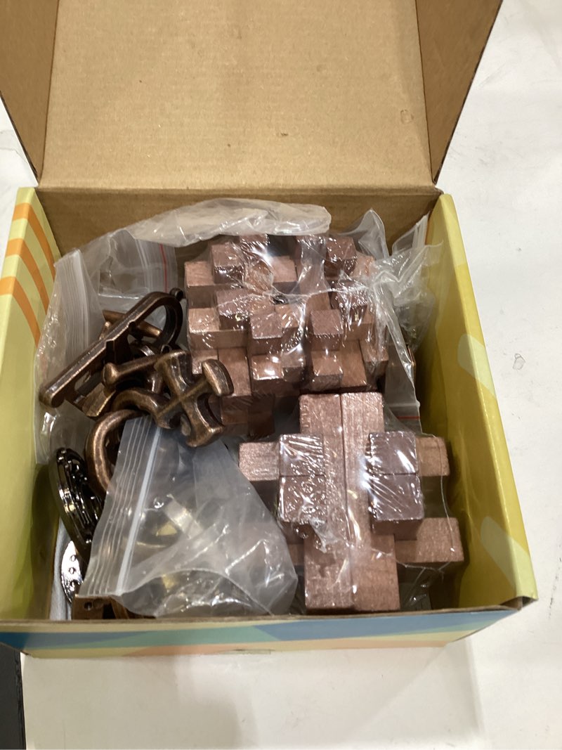 Condition photo showing Good Condition for 9pcs difficulty puzzles gift for adults, teens, and kids brain teaser puzzles game desk toys style b