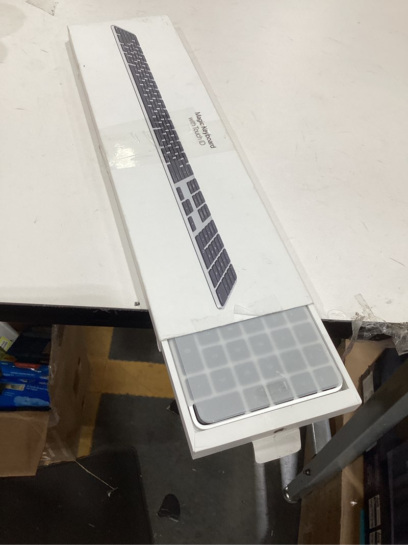 Condition photo showing New/Like New for Apple Magic Keyboard with Touch ID and Numeric Keypad for Mac Models with Apple Silicon - US English - Black Keys USB-C Black Keys
