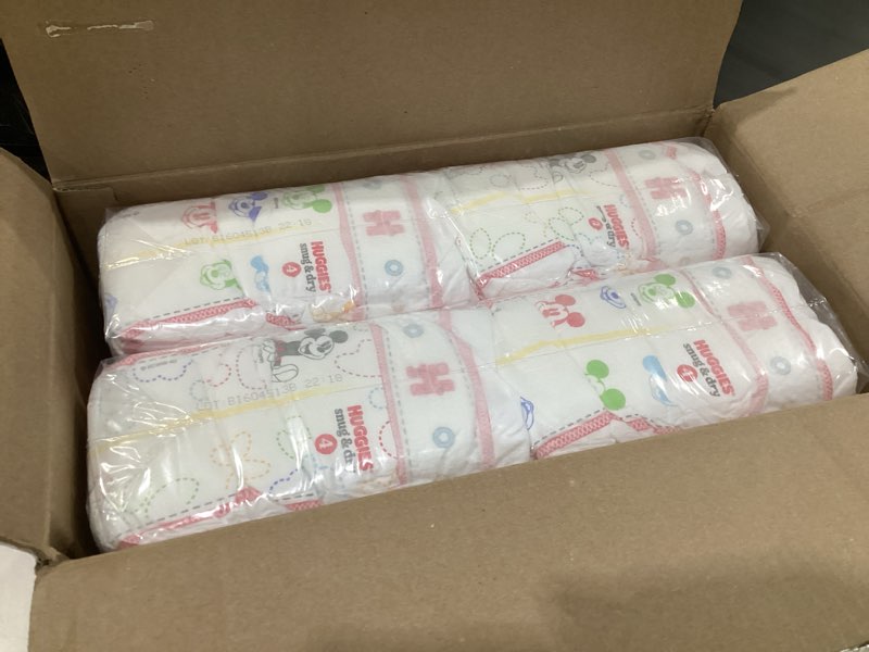 Condition photo showing Good Condition for huggies size 4 diapers, snug & dry baby diapers, size 4 (22-37 lbs), 92 count, packaging may vary size 4 92