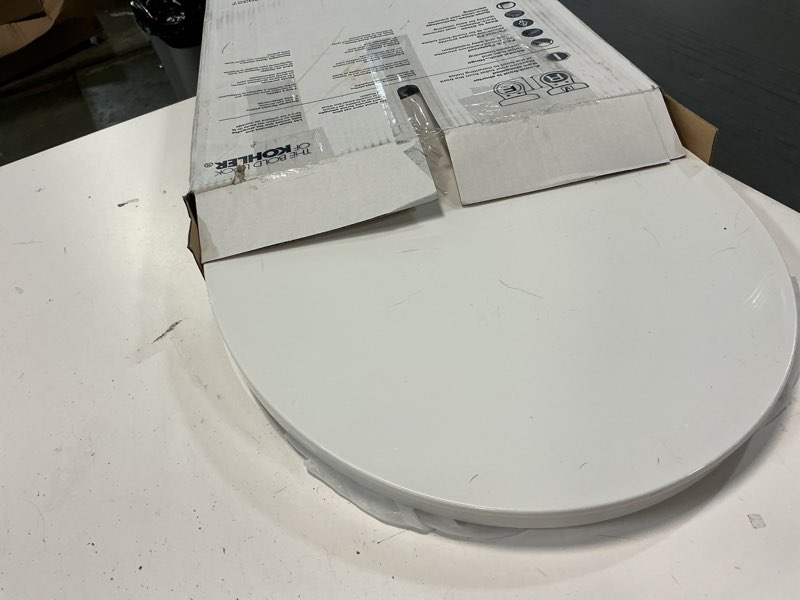 Condition photo showing As Is for KOHLER K-26802-0 Impro ReadyLatch Quiet Close Round Toilet Seat, White Toilet Seat, Grip-Tight Bumpers, New Home Essentials, Slam Prevention White Round