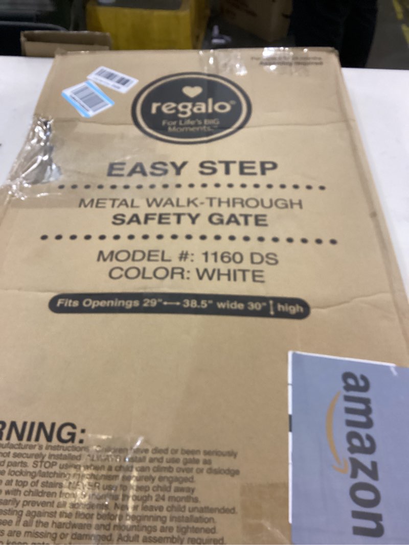 Condition photo showing As Is for Regalo Safety 38" Baby Gate for Doorways & Bottom of Stairs, Pressure Mount Design for Babies, Toddlers & Pets, Tested & Safe for 30 Years, American Designed, American Owned, White White 29-38.5"W x 30"H