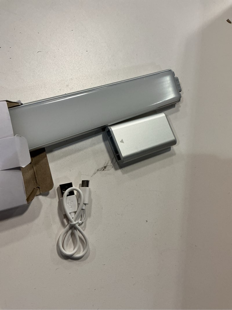 Condition photo showing Good Condition for EZVALO Under Cabinet Lighting, 2200mAh Rechargeable Battery, 76 LEDs Dimmable Closet Lights, 3 Color Temps, Motion Sensor Light Indoor for Kitchen, Wardrobe Silver 1pc