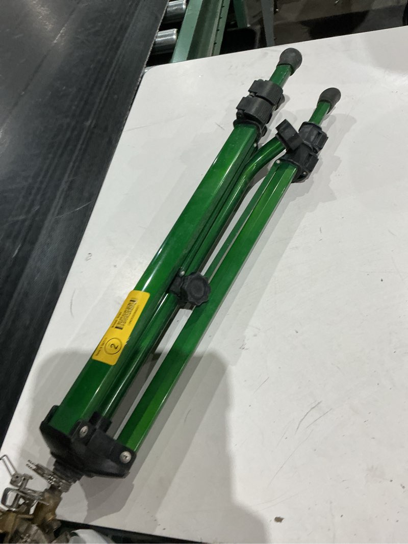 Condition photo showing As Is for heavy duty brass lawn impact sprinkler on tripod base