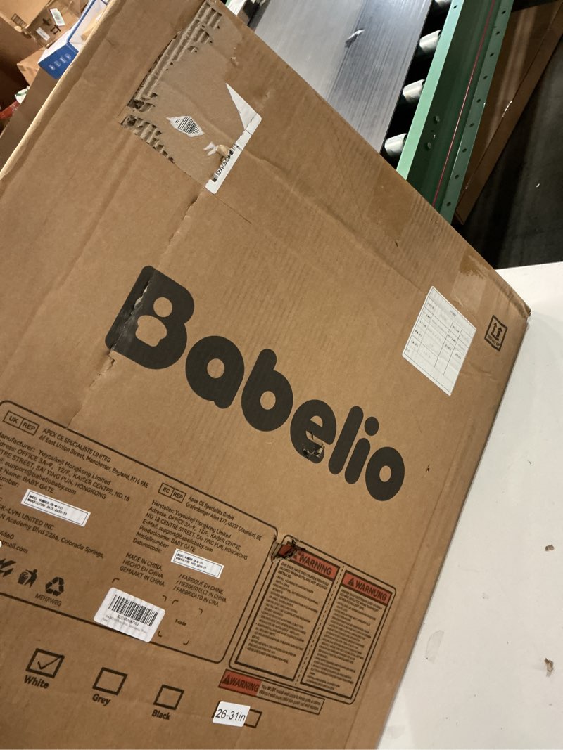 Condition photo showing New/Like New for BABELIO Baby Gate for Doorways and Stairs, 26-31" Pet Gate with Wide Walk Thru Door and Lock Indicator, No Drill Pressure Mounted Safety Gate with Double Lock and Self-Closing, White White 26-31"W, 30"H