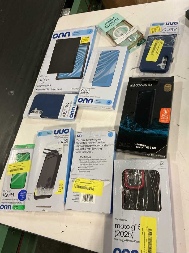 Condition photo showing As Is for assorted cellphone/tablet/laptop case covers & accessories(variedades)