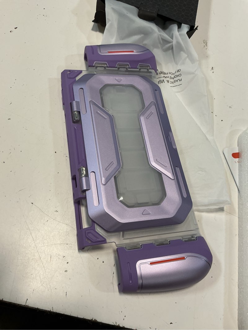 Condition photo showing Good Condition for mumba dockable for nintendo switch 2 case with flip stand, [titan] ergonomic switch 2 grip protective cover holds 5 game cards & 2 tf cards tpu accessories and quick-release joy-con design (violt)