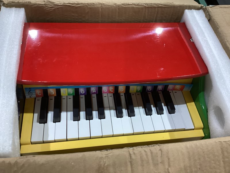 Condition photo showing Good Condition for Melissa & Doug Learn-to-Play Piano with 25 Keys and Color-Coded Songbook Toy Piano Kids, Toddler Toys for Ages 3+