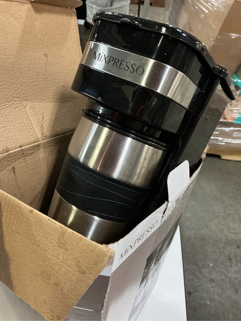 Condition photo showing As Is for mixpresso black personal single serve coffee maker with 14oz travel mug, drip small coffee maker with auto shut off, reusable filter, works with ground coffee only – not for k-cup pods