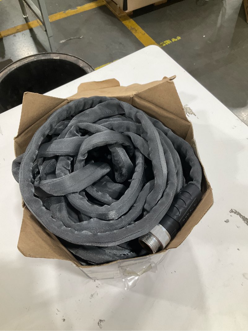 Condition photo showing As Is for zero-g teknor apex 5/8-in x 100-ft premium -duty kink free woven gray hose