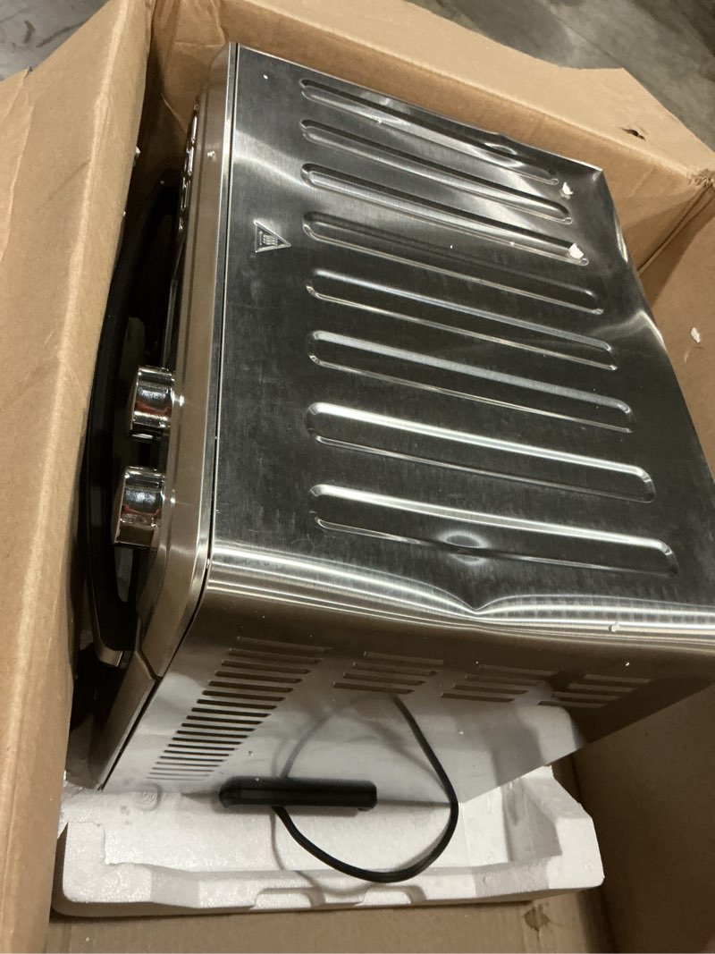 Condition photo showing As Is for cuisinart air fryer toaster oven with extra-large capacity, 1800w stainless steel oven with digital display, bake, broil, roast & air fry options, adjustable temperature, toa-95nas 0.95 cu ft. interior