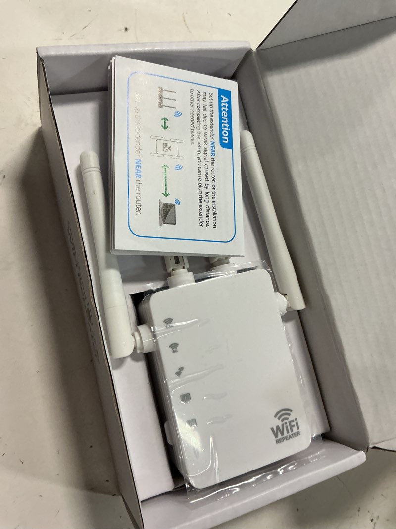 Condition photo showing New/Like New for dual band wifi signal booster 1200mbps with 4 antennas