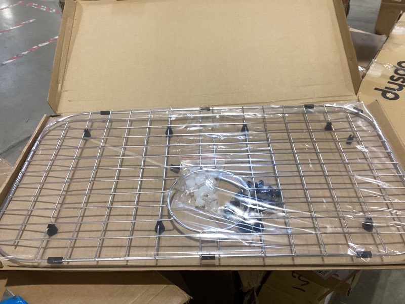 Condition photo showing Good Condition for serene valley sink protector grid 26-1/16" x 14-1/16", rear drain with corner radius 3-1/2", 304 stainless steel material nlw2614r