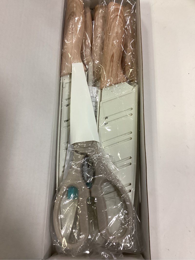 Condition photo showing New/Like New for Astercook Knife Set, 13 Pieces Kitchen Knives Set with Ceramic Coating, Stainless Steel Chef Knife Sets with 6 Blade Guards, Dishwasher Safe Knives with Wooden Handle, White