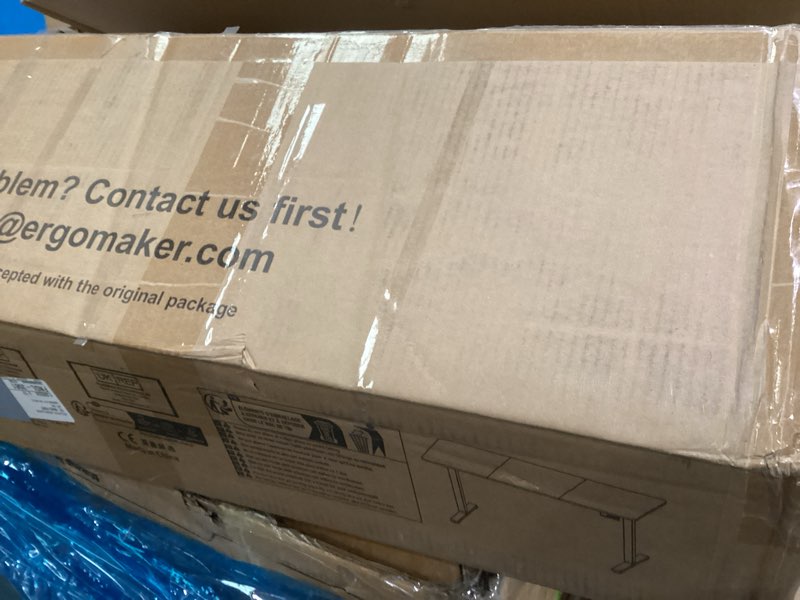 Condition photo showing As Is for ERGOMAKER 55" Electric Standing Desk, Adjustable Height, Sit Stand Up Desk for Home Office & Compute